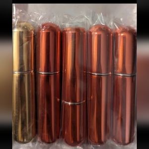 Refillable perfume containers